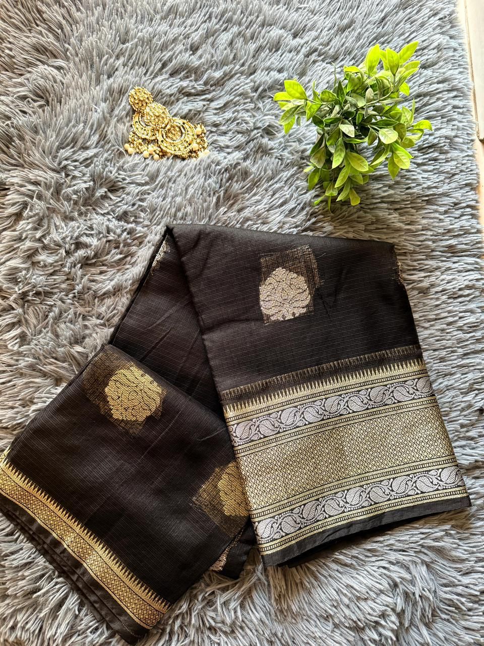 Charcoal black Kota saree with silver zari motifs and paisley woven border