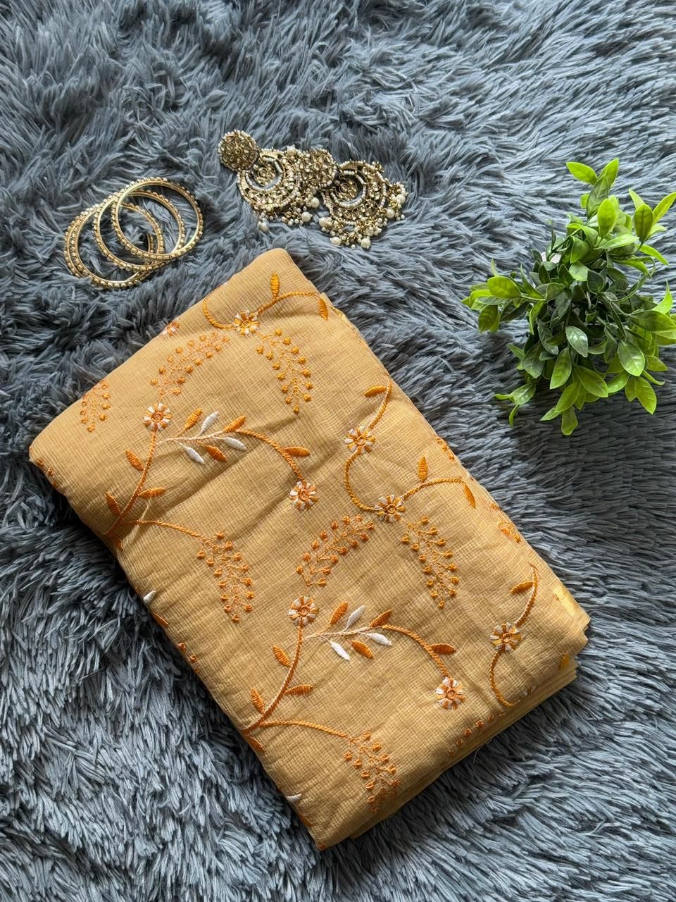 Mustard yellow Kota Doria saree with floral vine embroidery on handloom cotton