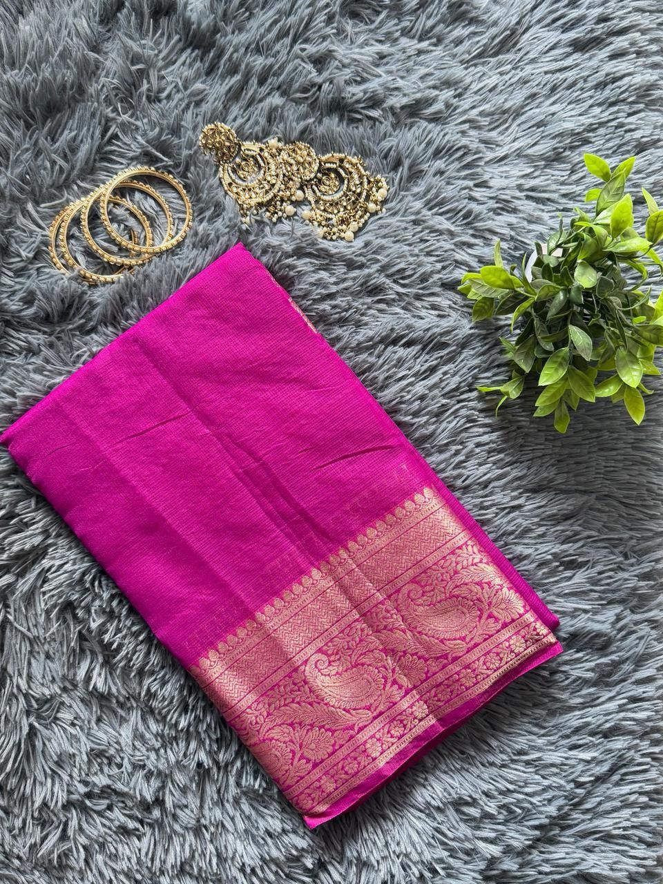 Rani pink Kota silk saree with elaborate gold zari border weave